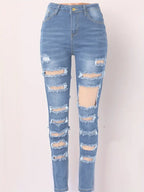 Jeans Ajustados Desgastados y Rasgados